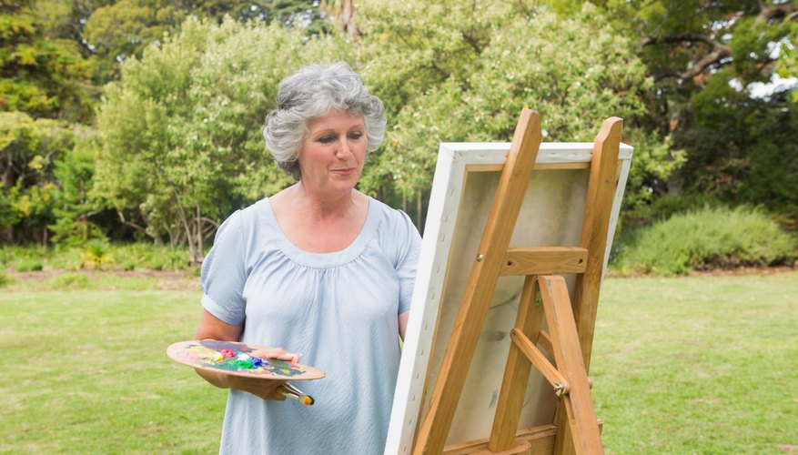 Photo Credit: Wavebreakmedia Ltd/Wavebreak Media/Getty Images Painting a canvas.