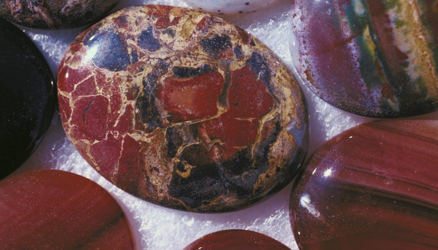 Cabochons are domed gems with a 45-degree shoulder for setting. Cabochons are domed gems with a 45-degree shoulder for setting.