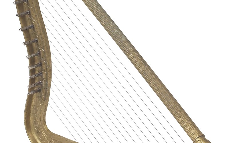 The PVC harp mimics the shape and size of a wood musical harp. The PVC harp mimics the shape and size of a wood musical harp.
