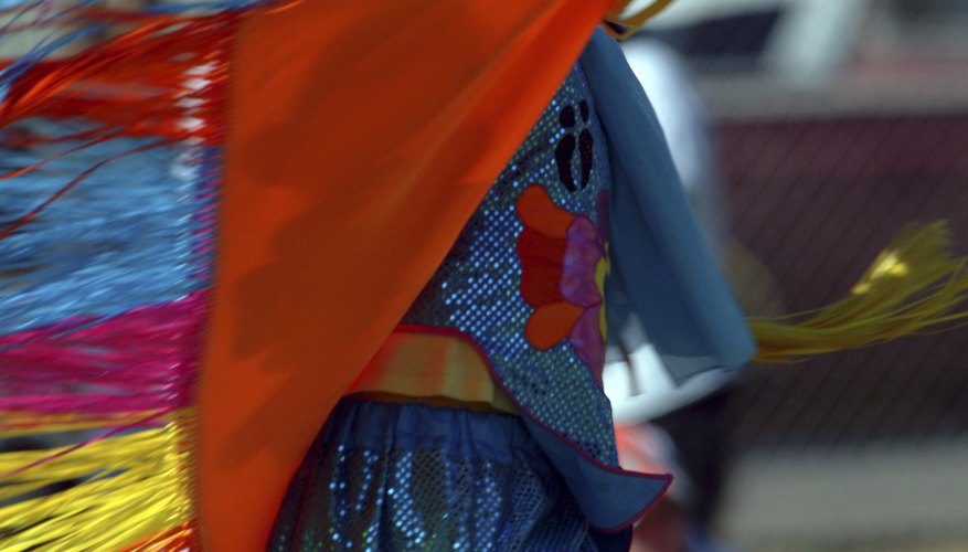 Fringed shawls add to the drama of Native American dance. Fringed shawls add to the drama of Native American dance.