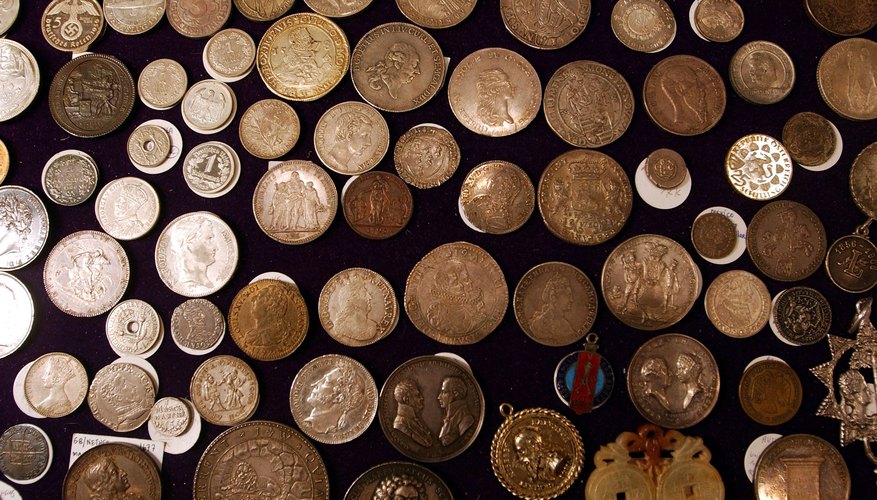 Photo Credit: Spencer Platt/Getty Images News/Getty Images 17th to 20th century european coins on display