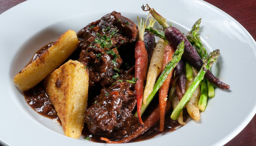 Polenta and other hearty starches are a perfect accompaniment to braised short ribs. Polenta and other hearty starches are a perfect accompaniment to braised short ribs.
