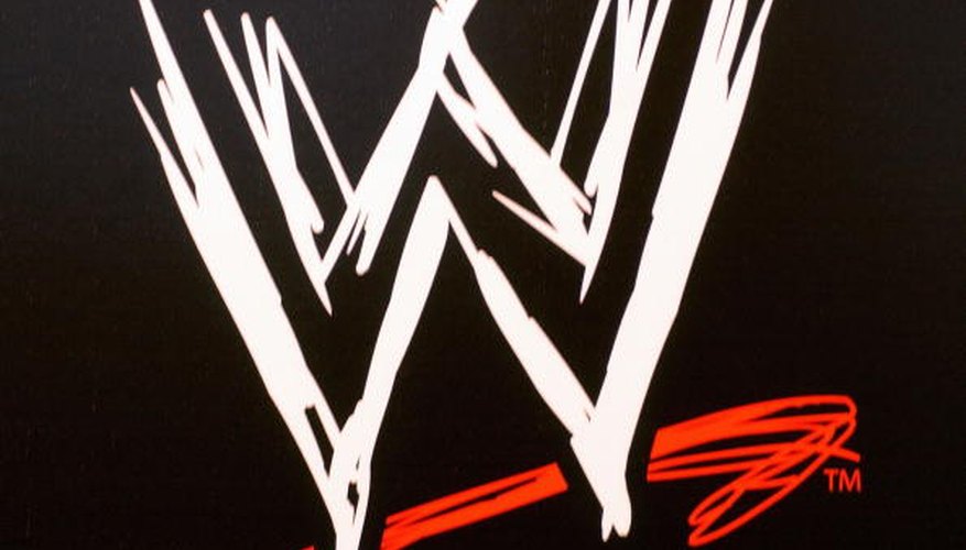 Photo Credit: Mark Mainz/Getty Images Entertainment/Getty Images The WWE logo appears several times on the title belt.