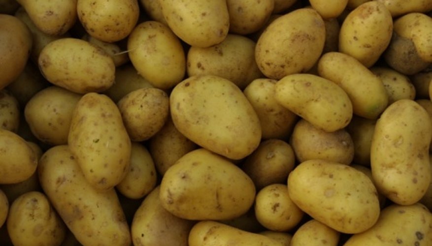 Nutrient-rich potatoes add much-needed nitrogen to compost heaps. Nutrient-rich potatoes add much-needed nitrogen to compost heaps.