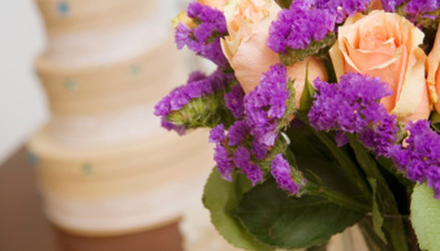 Enhance floral arrangement by adding battery-operated twinkle lights. Enhance floral arrangement by adding battery-operated twinkle lights.