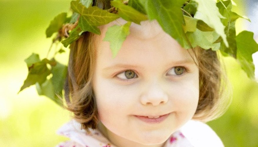 Once a laurel wreath is placed on a child's head, she is transformed into a Greek goddess. Once a laurel wreath is placed on a child's head, she is transformed into a Greek goddess.