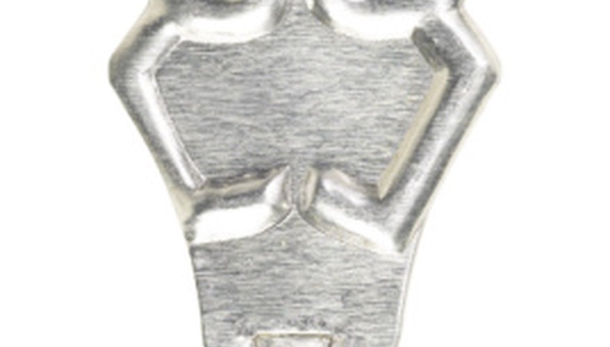 Hand needle threaders help guide thread through the eye of a hand needle. Hand needle threaders help guide thread through the eye of a hand needle.