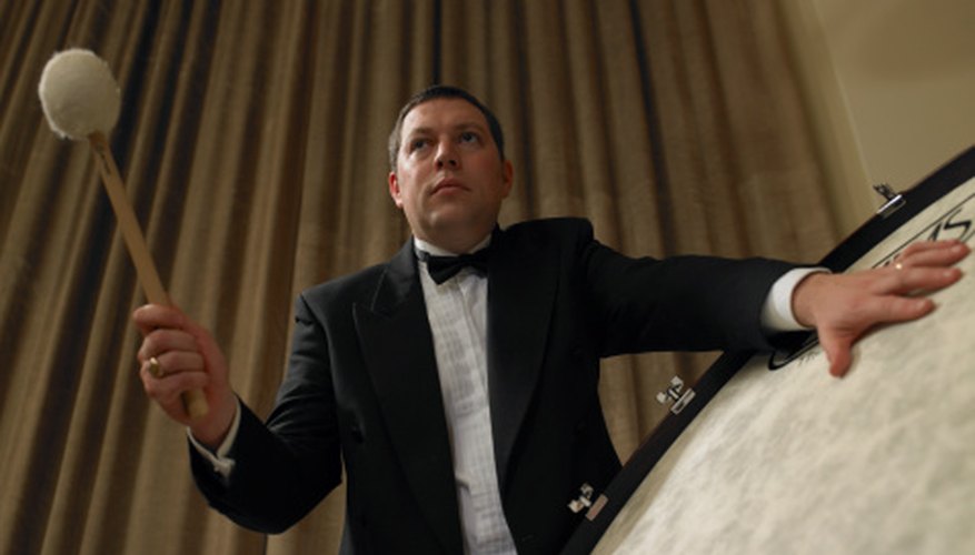 Photo Credit: Michael Blann/Photodisc/Getty Images Rhythm and tempo are derived from the percussion section.