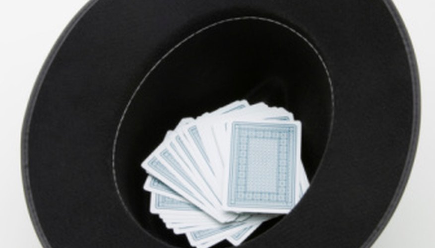 A hat can be used during performances to dispose of cards without leaving a large mess. A hat can be used during performances to dispose of cards without leaving a large mess.