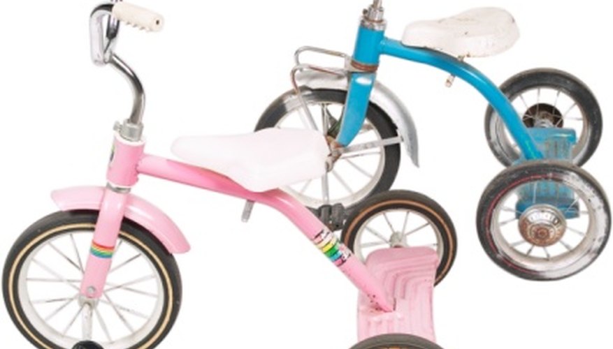 A tricycle is a typical learning bike for children. A tricycle is a typical learning bike for children.
