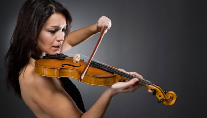 Photo Credit: Jupiterimages/Polka Dot/Getty Images In many ways, the violin section is the cornerstone of an orchestra.