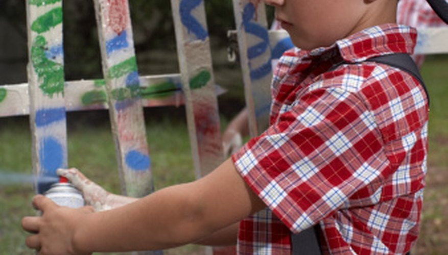 A little fence can be sprayed with aerosol paint. A little fence can be sprayed with aerosol paint.