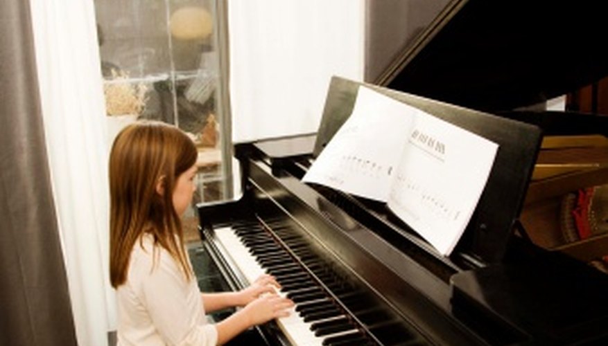 On a piano, lower notes are played by the left hand, higher notes by the right. On a piano, lower notes are played by the left hand, higher notes by the right.