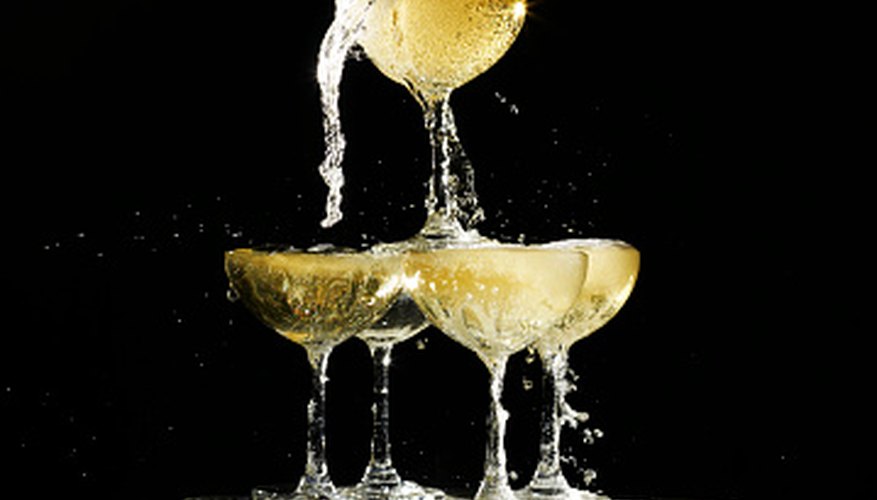 Champagne towers can be large or small. Champagne towers can be large or small.