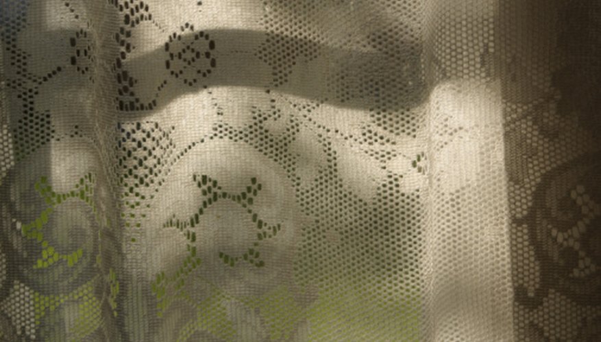 Filled and open meshes create patterns in filet crochet pieces. Filled and open meshes create patterns in filet crochet pieces.