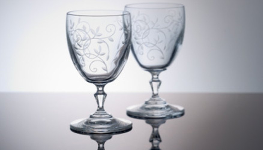 Etched stemware often has flower designs. Etched stemware often has flower designs.