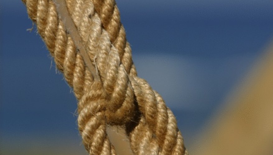 A tight knot is needed to bind two strings or ropes for weaving. A tight knot is needed to bind two strings or ropes for weaving.