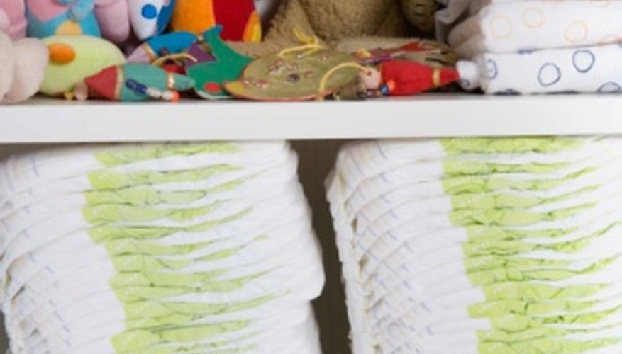 Make a diaper tower with baby diapers and toys. Make a diaper tower with baby diapers and toys.