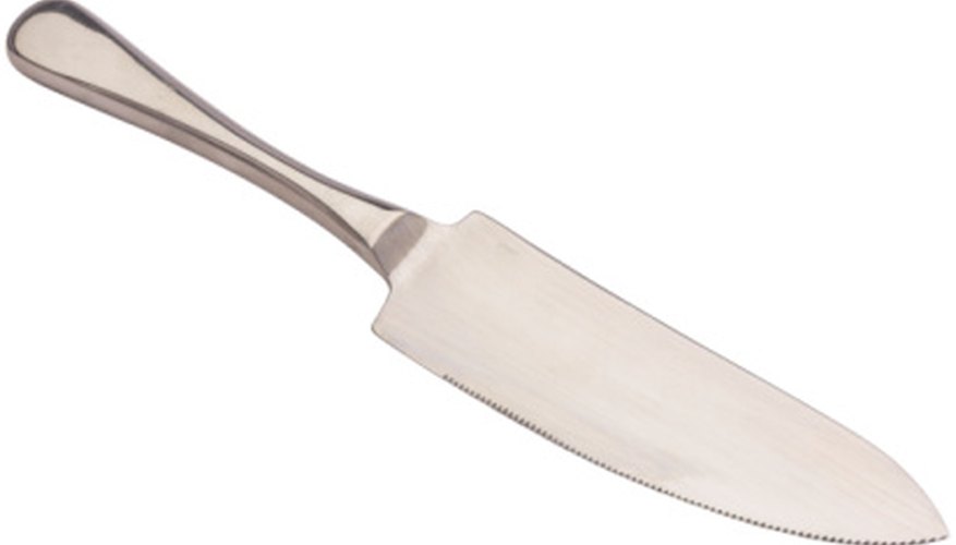 Use a galvanized metal etching spray primer on metallic knife handles. Use a galvanized metal etching spray primer on metallic knife handles.