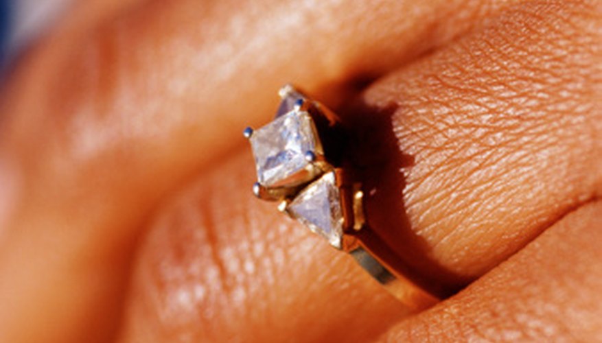 Make a fondant ring that matches the bride's own ring. Make a fondant ring that matches the bride's own ring.