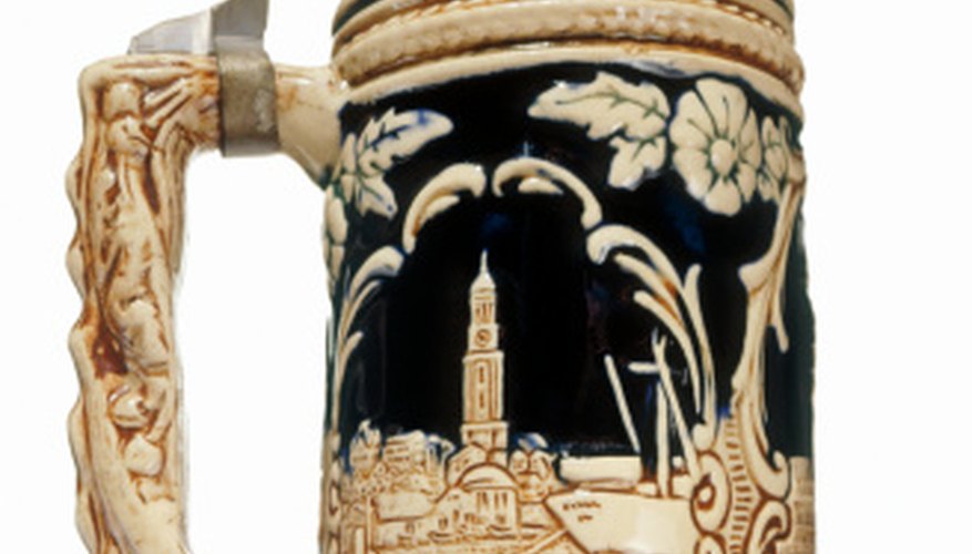 Imitation beer steins are designed to look almost identical to the genuine article, but small differences help collectors determine which are authentic. Imitation beer steins are designed to look almost identical to the genuine article, but small differences help collectors determine which are authentic.