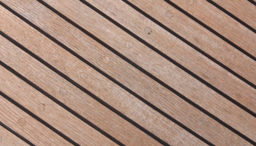 Teak has a yellow color with very few knots or grain patterns. Teak has a yellow color with very few knots or grain patterns.