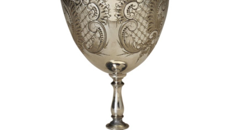 This ornate silver goblet may have been a christening or wedding gift. This ornate silver goblet may have been a christening or wedding gift.