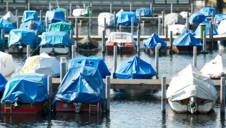 Canvas boat covers offer good protection against sun and rain. Canvas boat covers offer good protection against sun and rain.