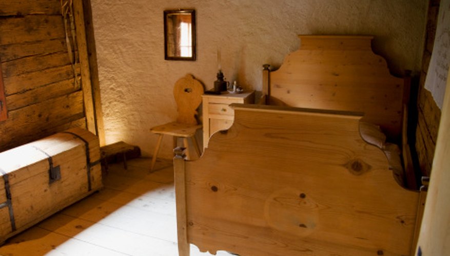 Always sand along with the bed's wood grain. Always sand along with the bed's wood grain.