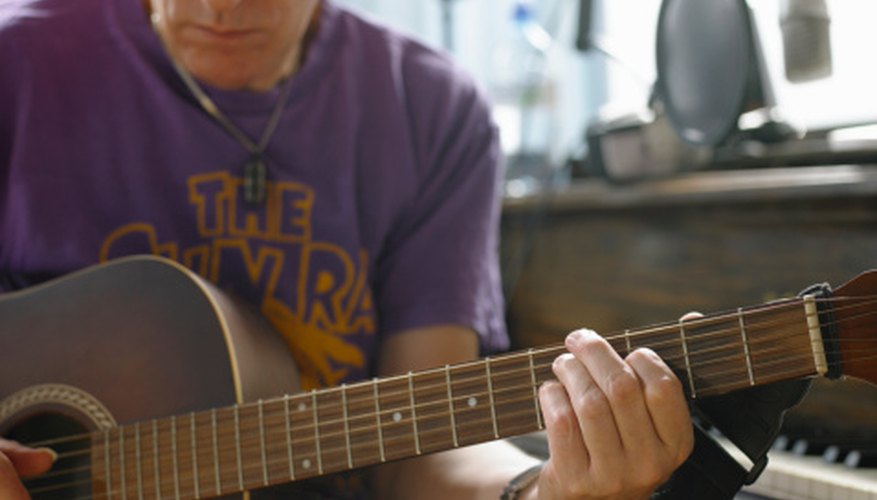 A capo fits on the guitar's neck to change the key of a song. A capo fits on the guitar's neck to change the key of a song.