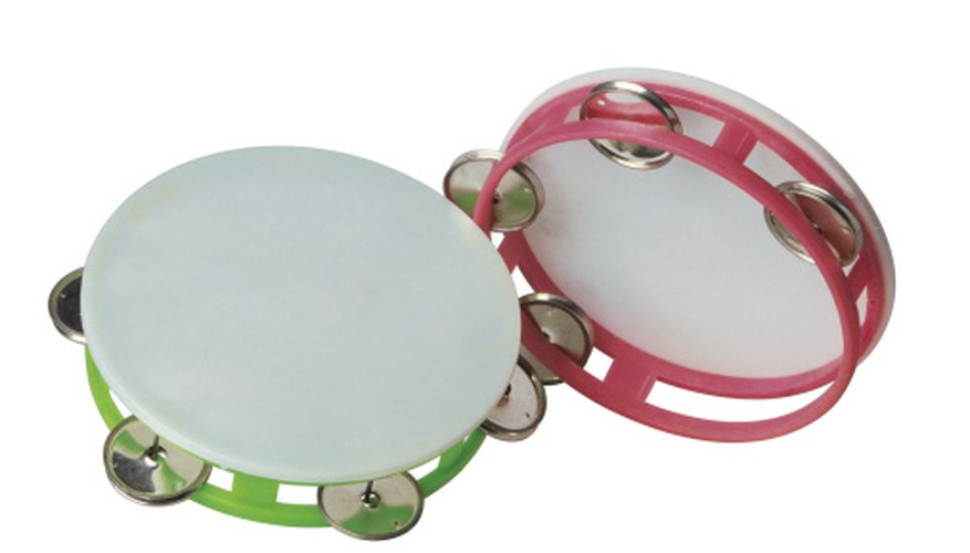 A tambourine is easy for a young child to hold and use. A tambourine is easy for a young child to hold and use.