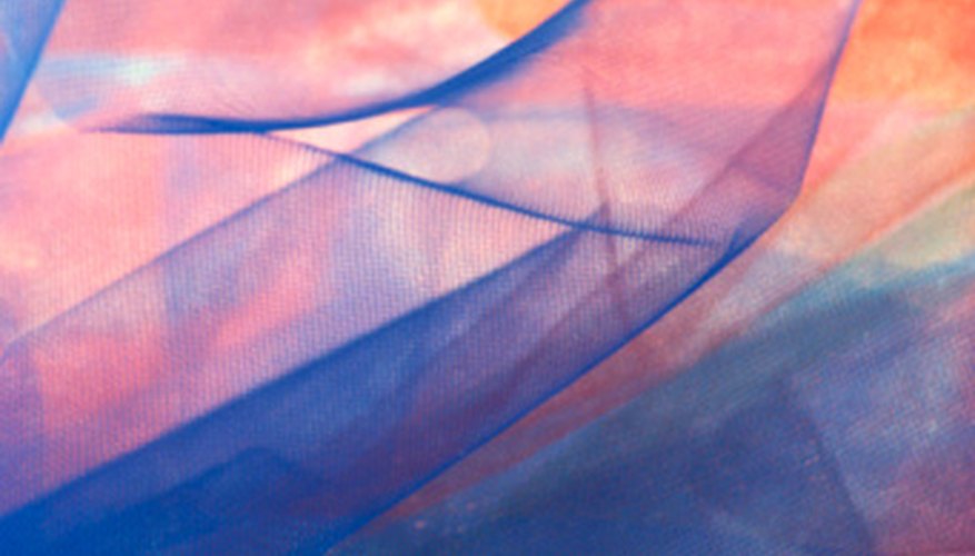 Use tulle to create a tutu-inspired dog collar. Use tulle to create a tutu-inspired dog collar.