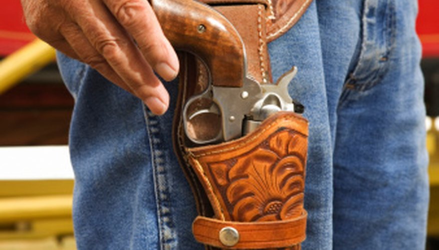 Holster leg thongs secure the bottom of the holster to the leg for security and a quicker draw. Holster leg thongs secure the bottom of the holster to the leg for security and a quicker draw.