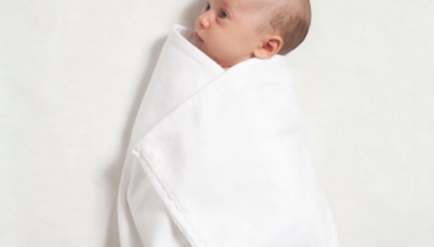 Newborn babies should be wrapped in warm receiving blankets. Newborn babies should be wrapped in warm receiving blankets.