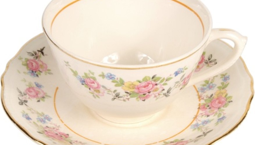 Delicate gold rims on antique cups can fade with frequent washings. Delicate gold rims on antique cups can fade with frequent washings.