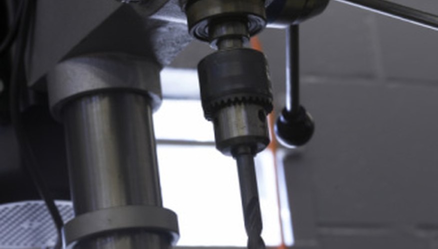 Use a carbide bit and a drill press when drilling into hard steel. Use a carbide bit and a drill press when drilling into hard steel.