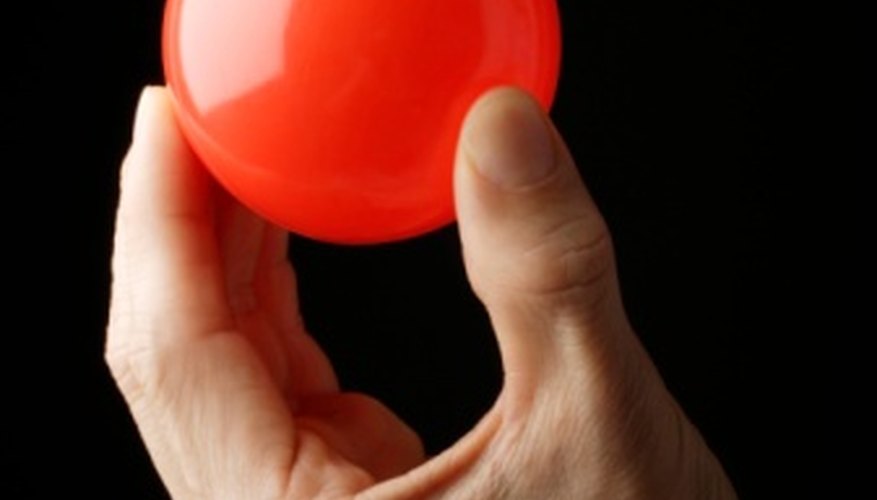 Distract your audience with one ball as you load the other. Distract your audience with one ball as you load the other.