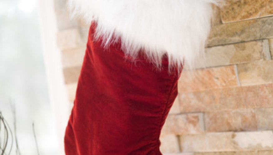 Hang your stockings on the fireplace with masking tape. Hang your stockings on the fireplace with masking tape.