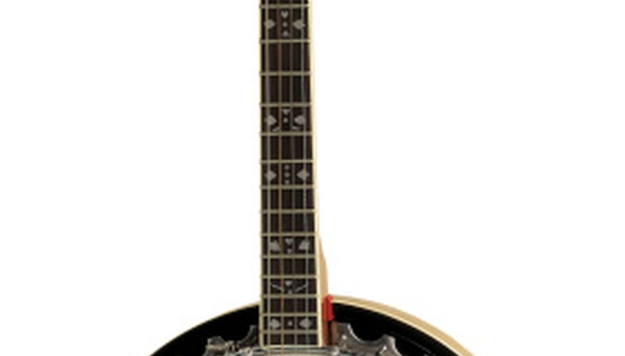 Muting a banjo can make practice time more bearable for neighbors and roommates. Muting a banjo can make practice time more bearable for neighbors and roommates.