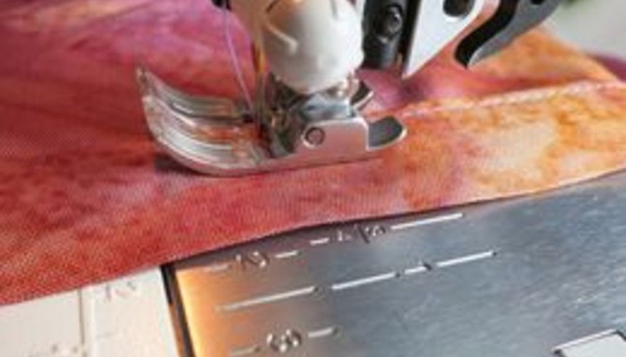Sew the hemline. Sew the hemline.