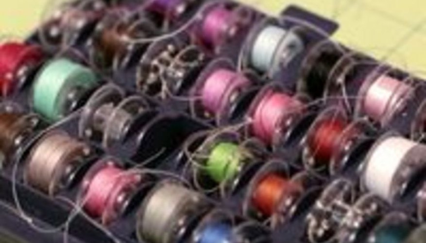 Find an empty bobbin. Find an empty bobbin.