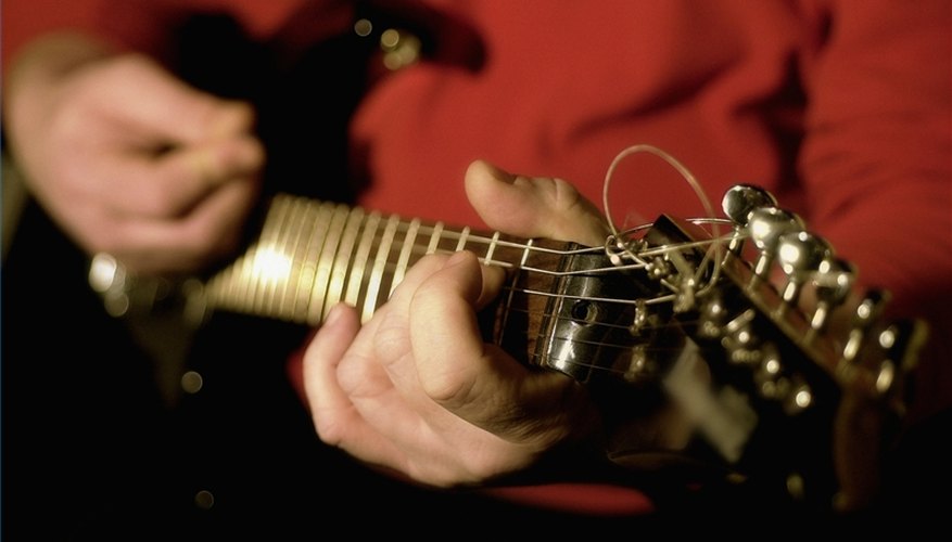 Tune a Guitar to E Flat Tune a Guitar to E Flat