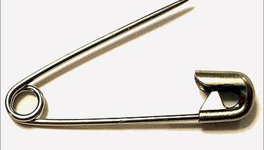 Safety pins are the key to how risque' your toga costume is. Safety pins are the key to how risque' your toga costume is.