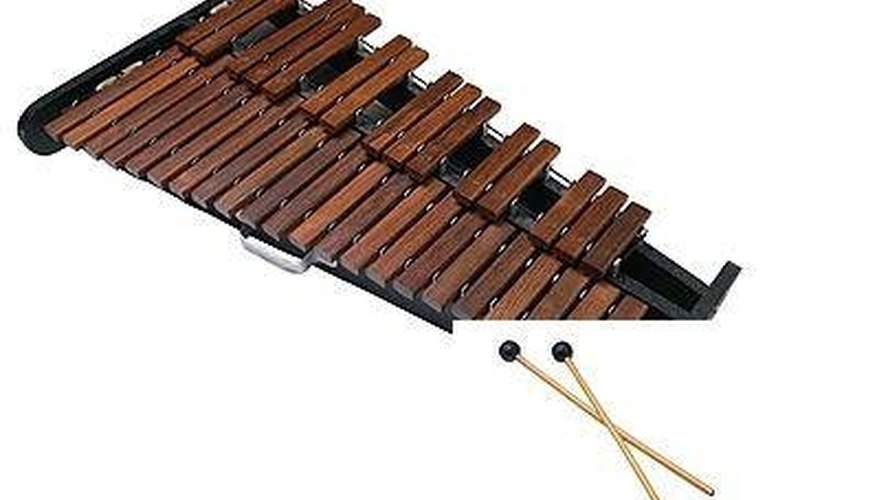 A xylophone keyboard and mallets A xylophone keyboard and mallets