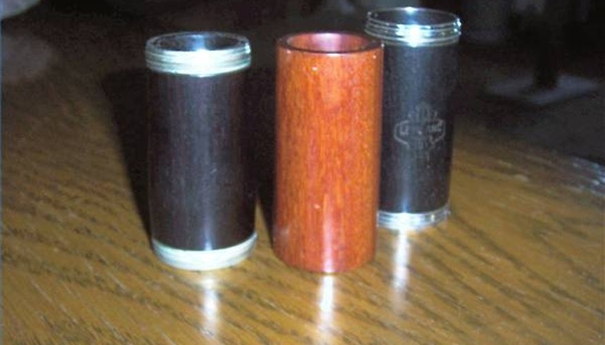 Two barrels of grenadilla wood, one of Brazilian hardwood. Two barrels of grenadilla wood, one of Brazilian hardwood.