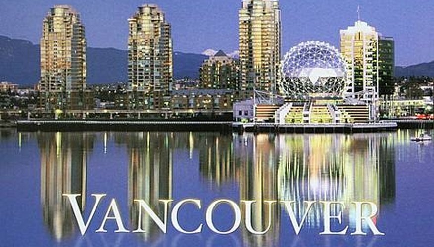 A postcard from Vancouver depicts a traditional city skyline with watery reflection. A postcard from Vancouver depicts a traditional city skyline with watery reflection.