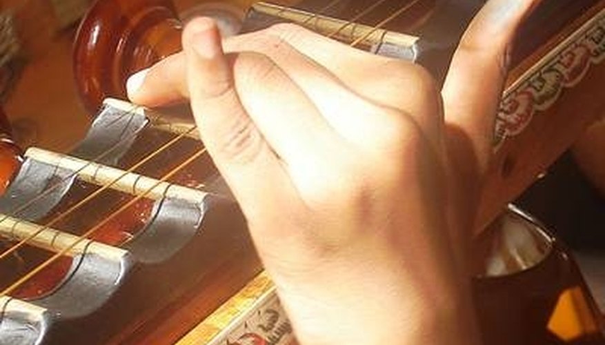 The fret board of a veena has a unique scalloped shape. The fret board of a veena has a unique scalloped shape.
