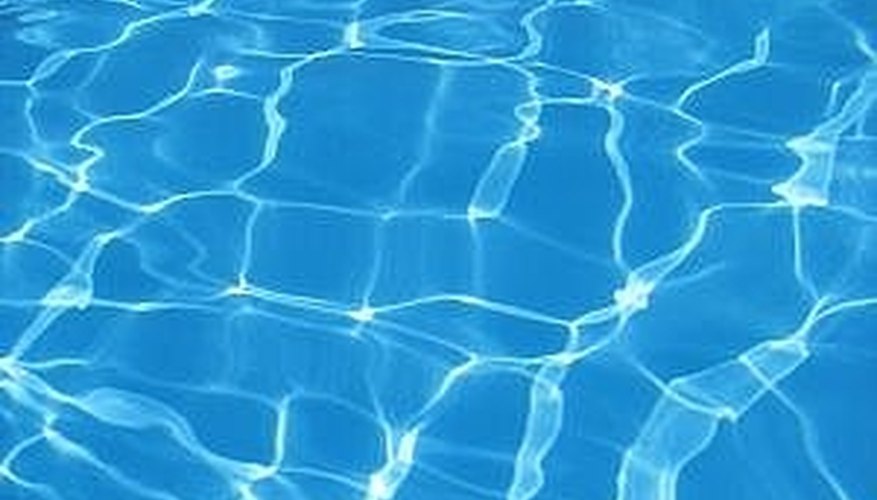 Fill the in-ground swimming pool with water. Fill the in-ground swimming pool with water.