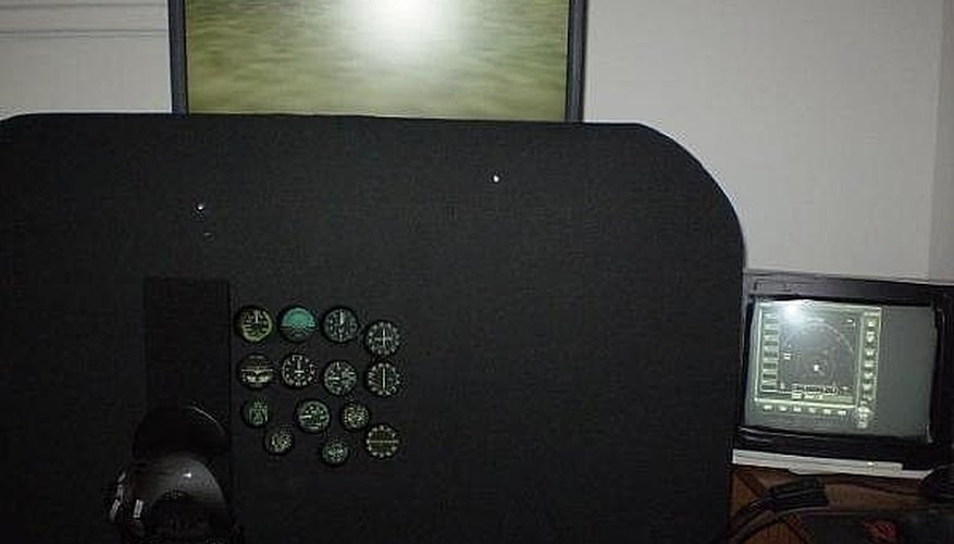 My setup, note the Garmin GPS on a cheap CRT monitor. My setup, note the Garmin GPS on a cheap CRT monitor.