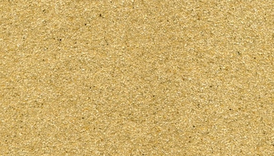 Smooth the wood with sandpaper. Smooth the wood with sandpaper.